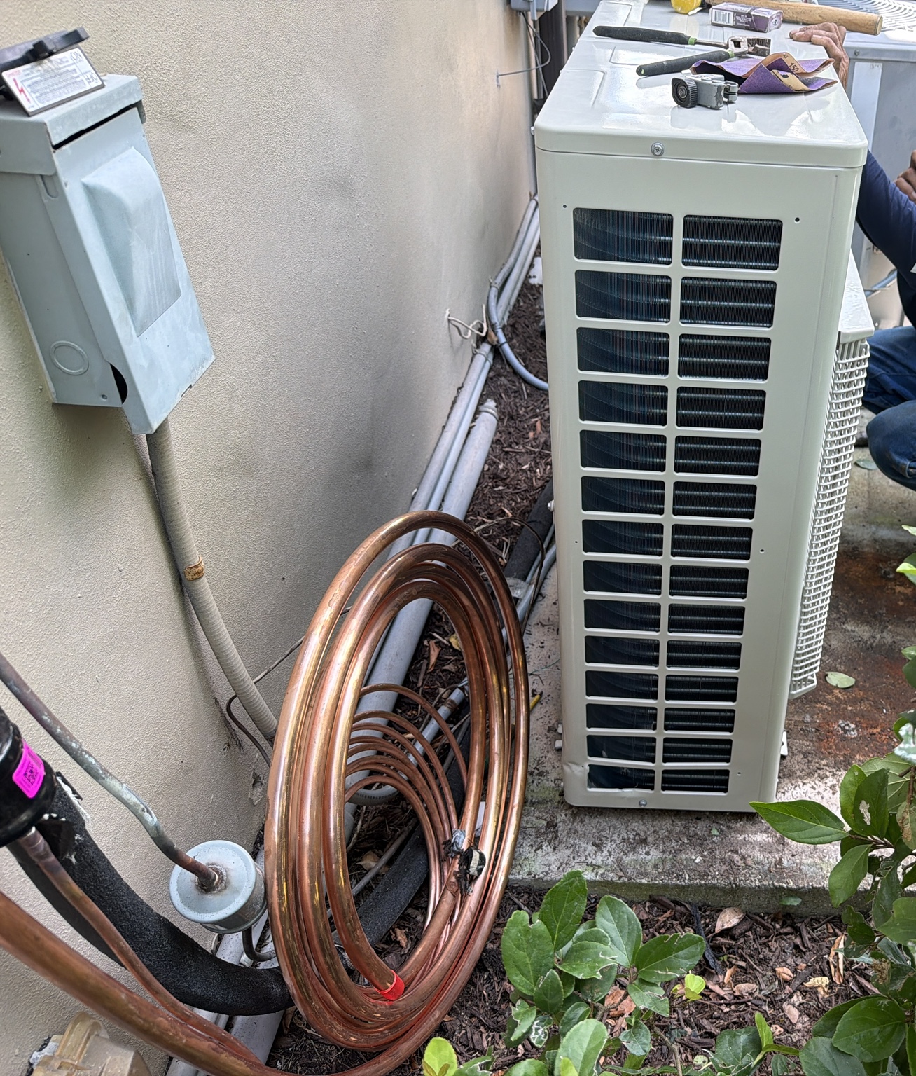 Outdoor condenser and copper lines during installation